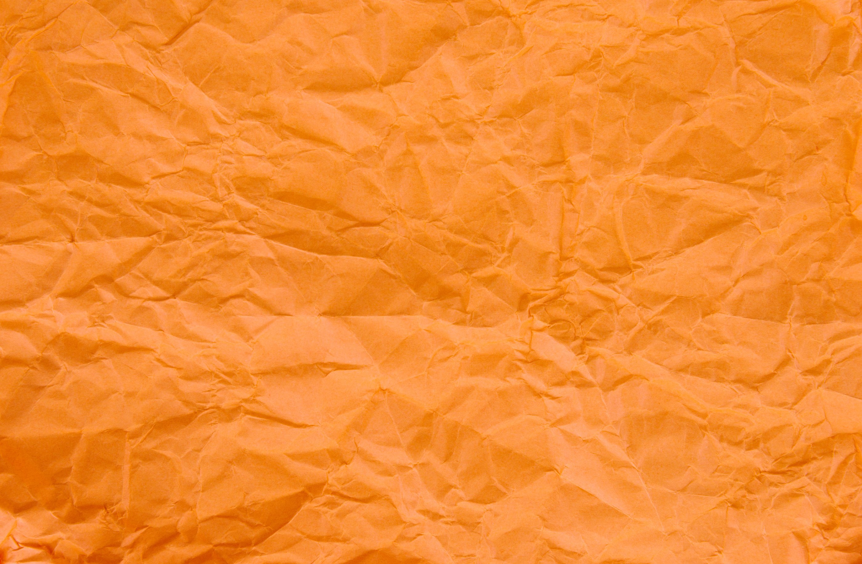 Texture of orange crumpled paper