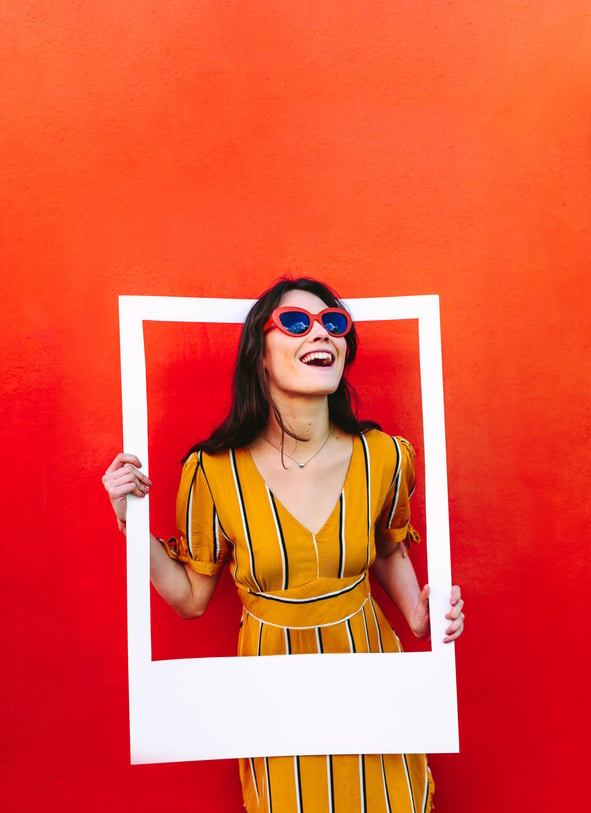 Stylish Woman with Large Photo Frame